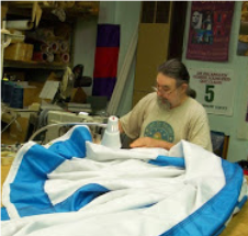 Sewing large banner. Sewing large banner.